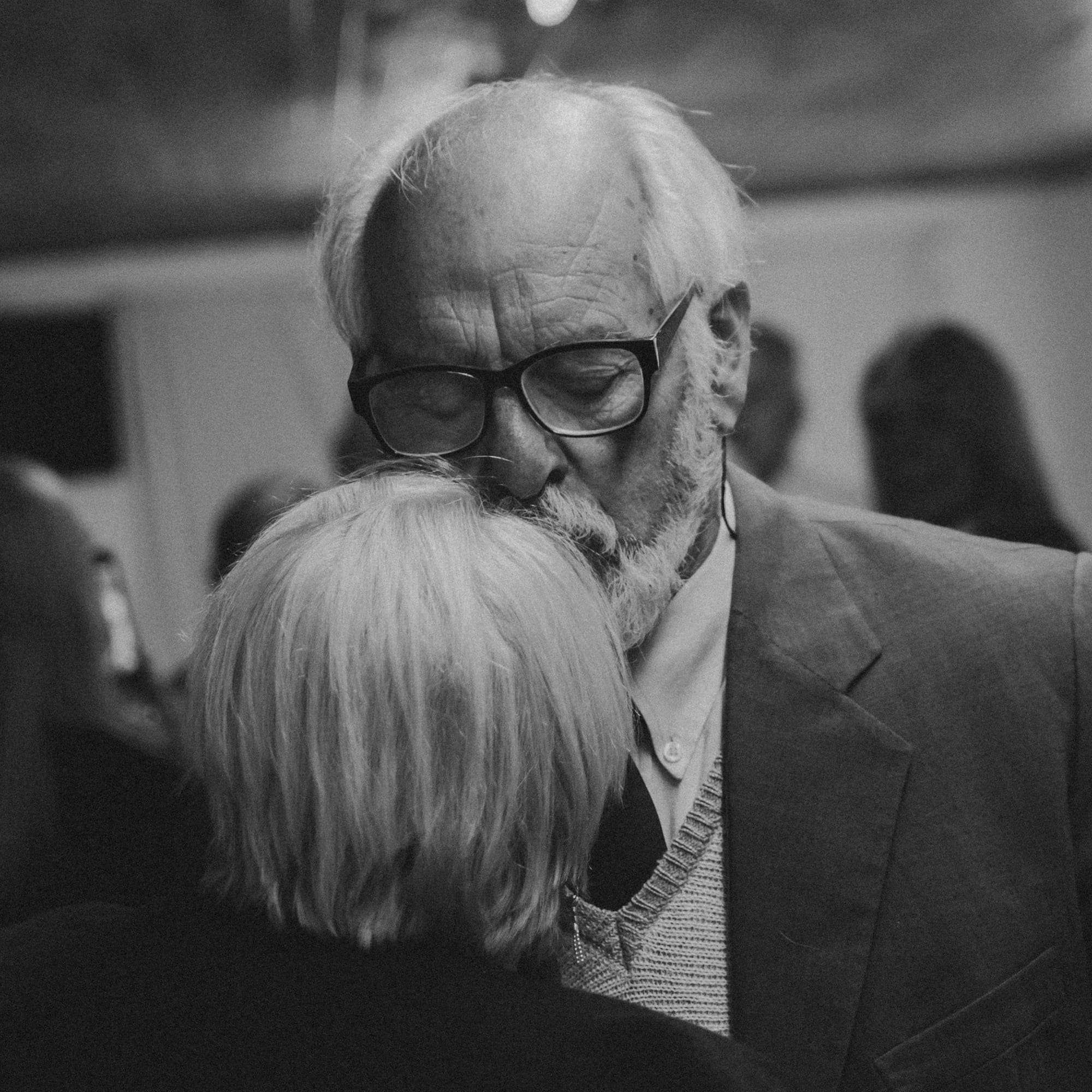 a black and white photo of a man and a woman